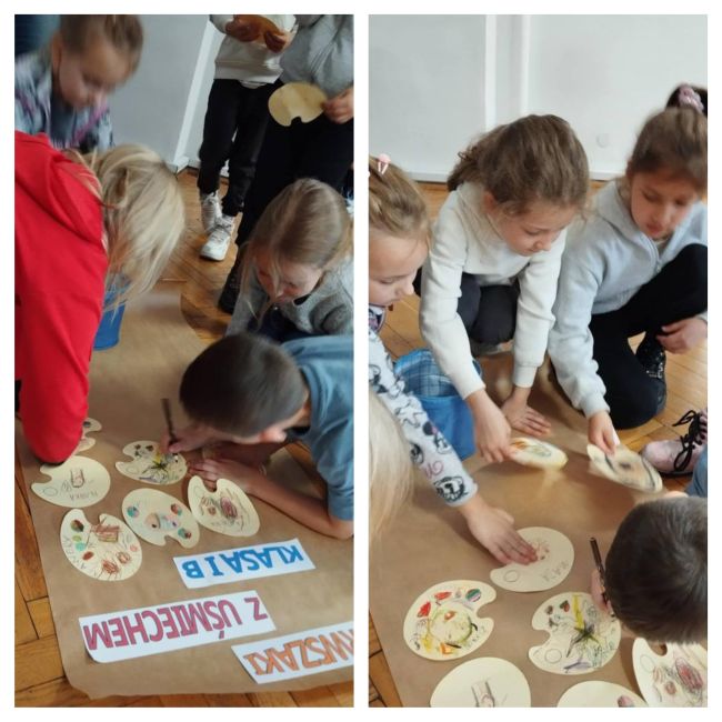 Uczennice wykonują plakat